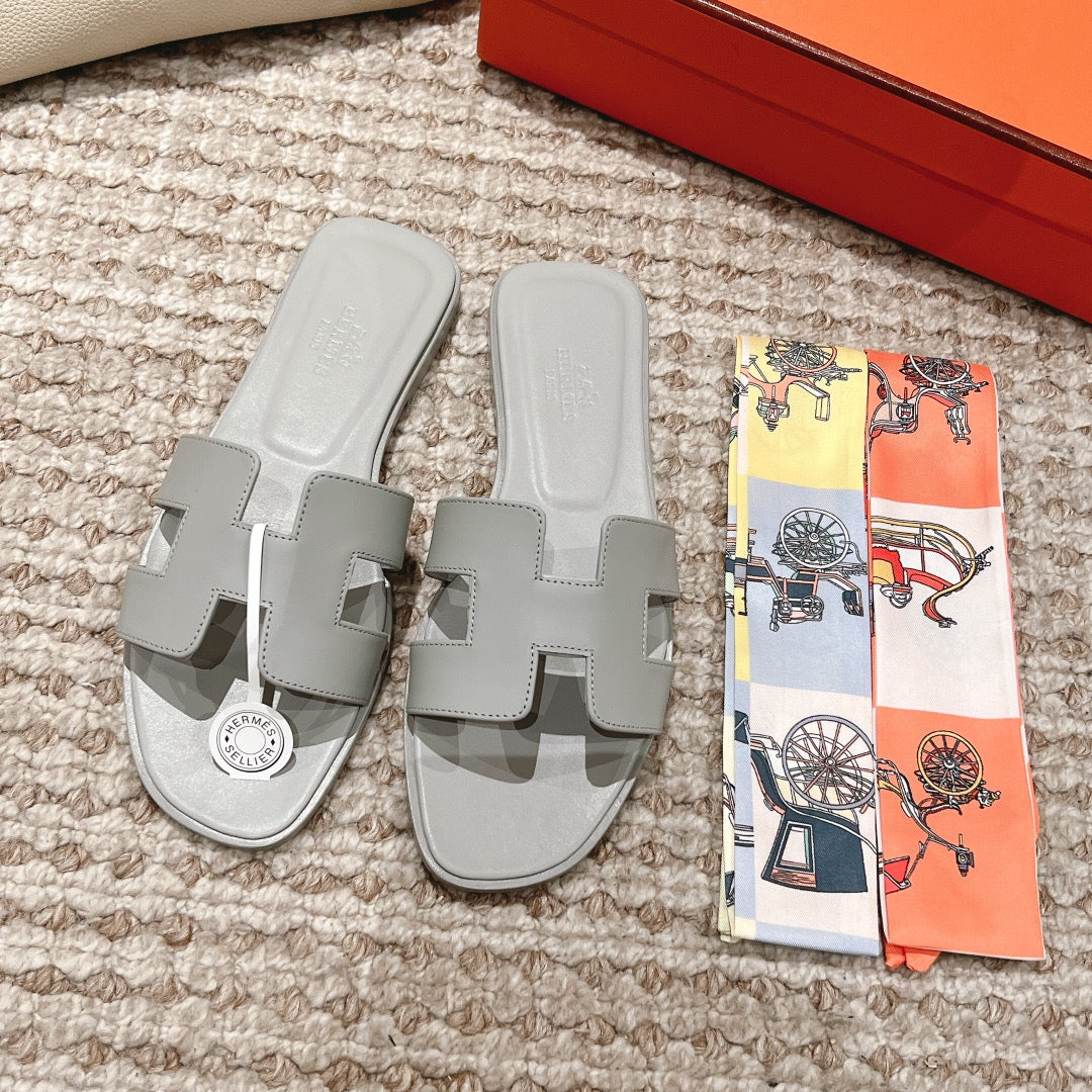 Mules plate cuir