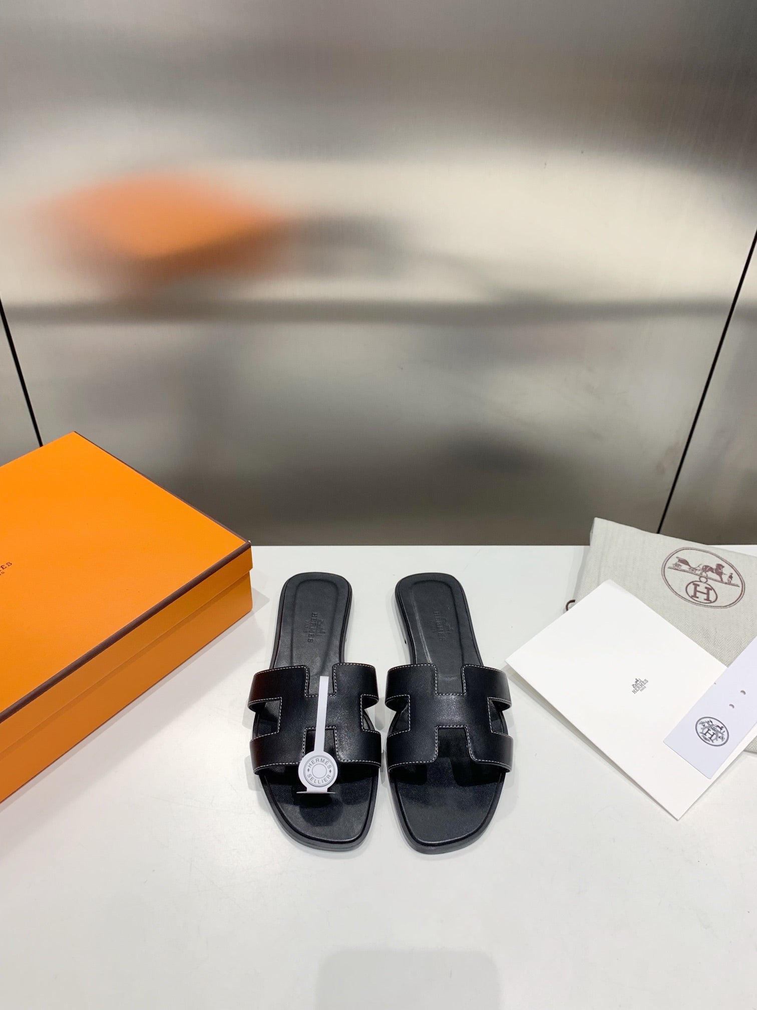 Mules plate cuir