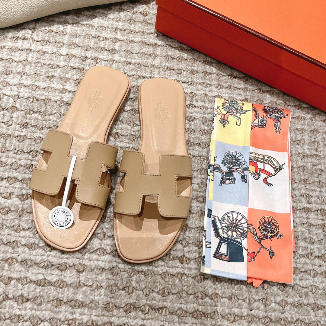 Mules plate cuir