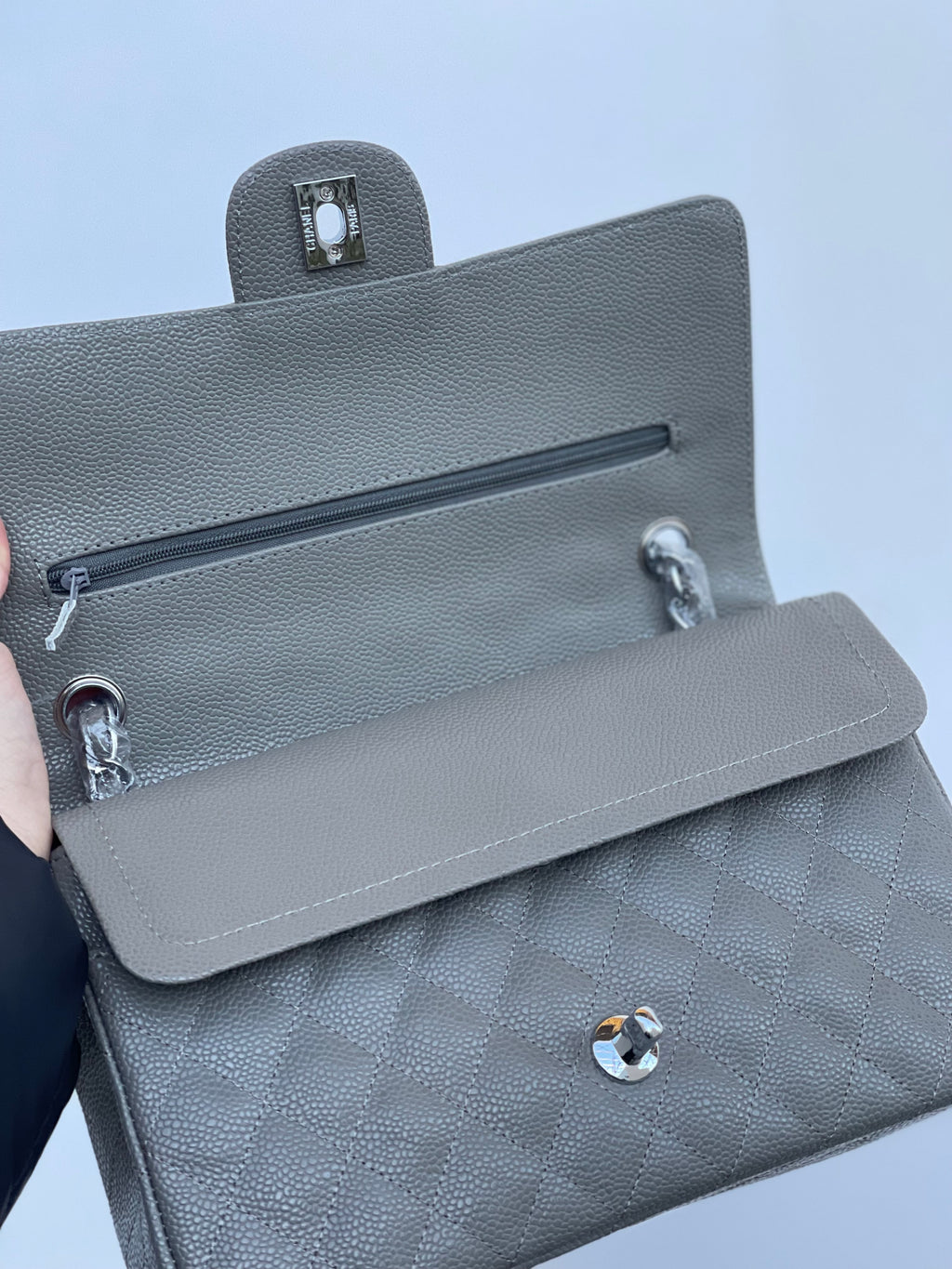 Sac matelassé gris